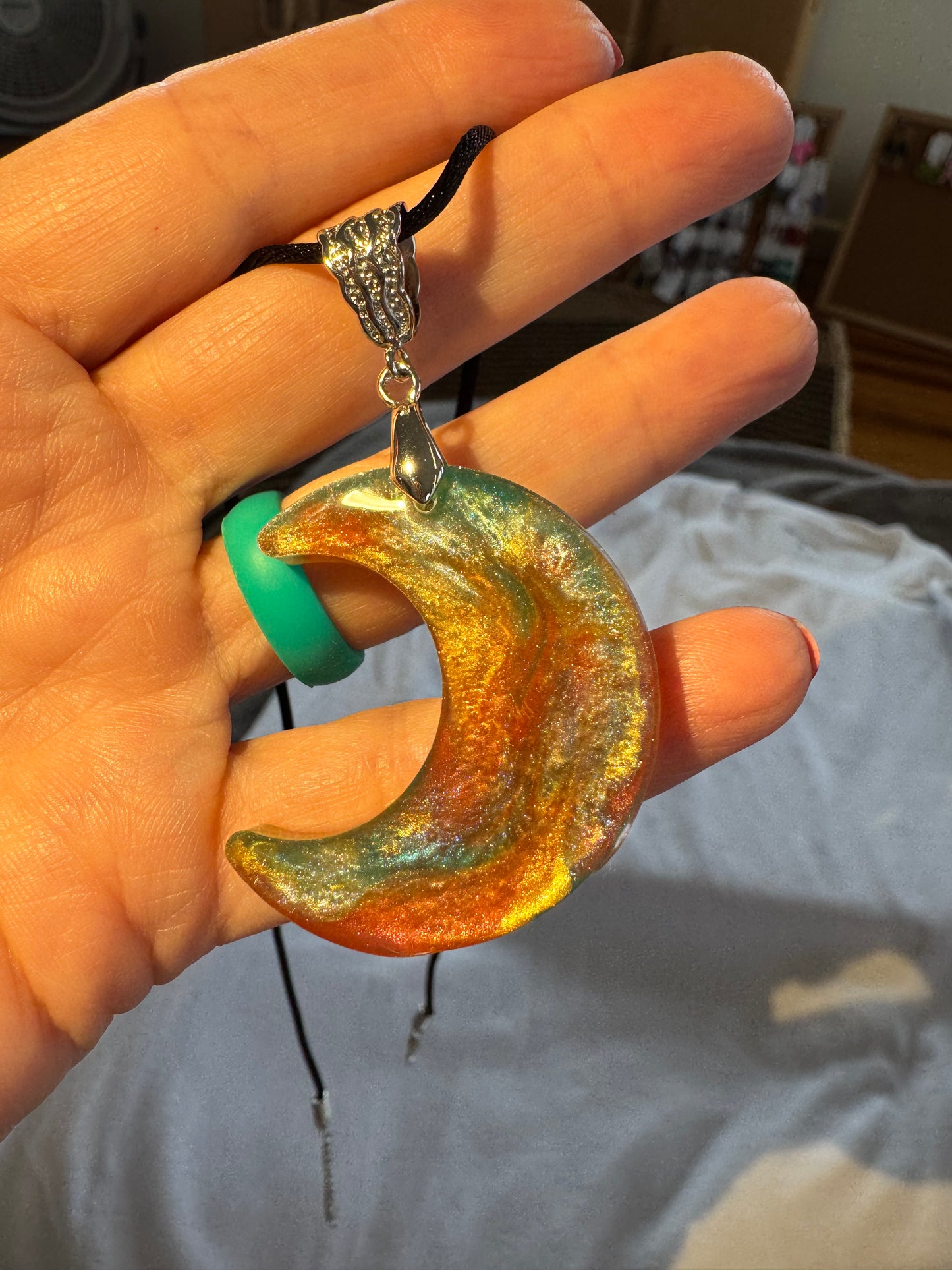 Resin Moon with Mica Color Swirl Necklace - Unique Design Pendant on Black Cord.
